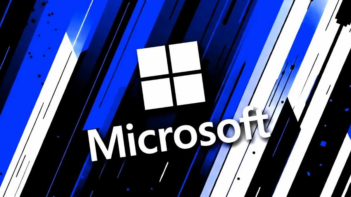A Microsoft logója és felirata kék, fekete és fehér csíkos háttér előtt